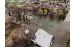 A national report on Canada's climate preparedness never mentions Gatineau or the Outaouais, even as spring floods keep returning to neighbourhoods like Pointe-Gatineau, an omission that traces back to Quebec holding the federal strategy at arm's length and leaving the region's defences split between governments. Photo: Courtesy of the City of Gatineau