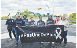 Maison d'INGRID and supporting organizations gathered beside Gatineau's Parc Mémoire d'Elles on October 7 in response to the death of Monique Thibault Poirier, a 77-year-old Laval woman whose death is the 19th suspected femicide in Quebec this year.  Photo: Tashi Farmilo