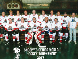 Aylmer Voyageurs just before the team’s first game. 
Front row, from left: Bill McCrank, Barry Meacham, Dan Raposo, Chris Andrusek,
Chuck Ethier. Back row, from left: Robin Mallory, Claude Bourck, Jacques Savoie, Pierre Paul Lortie, John Mitchell, Jean Charbonneau, Jerry Kreuk, Mario Vetere, Joe Chiuchiarelli, Cam Mooresv