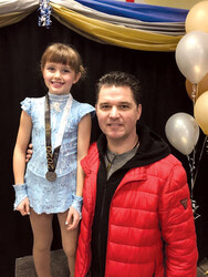 Kalyna Pelletier et son entraineur Justin Bell.  
Photo: Courtoisie