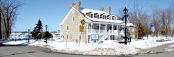 Street view of the Auberge Symmes Inn Museum. Two signs point to the location as a museum, yet the lettering is too small and/or vague to identify the location for many Aylmerites.
Photo: Lily Ryan